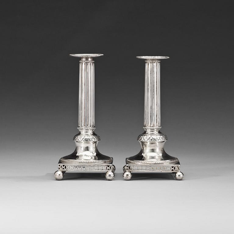 A matched pair of Swedish 18th century silver candlesticks, marks of Johan Wilhelm Zimmerman, Stockholm 1799.
