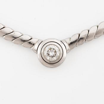 An 18K white gold necklace set with a round brilliant-cut diamond.