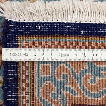 A Kerman carpet, circa 403 x 301 cm.