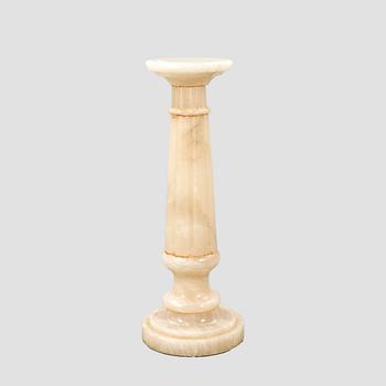 An alabaster pedestal later part of the 20th century.