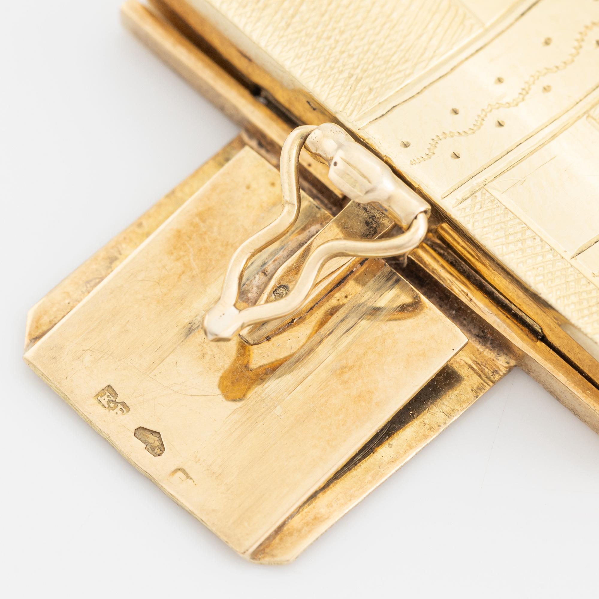 A 14K gold bracelet.