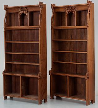 A set of two Swedish Art Noveau mahogany book cases.