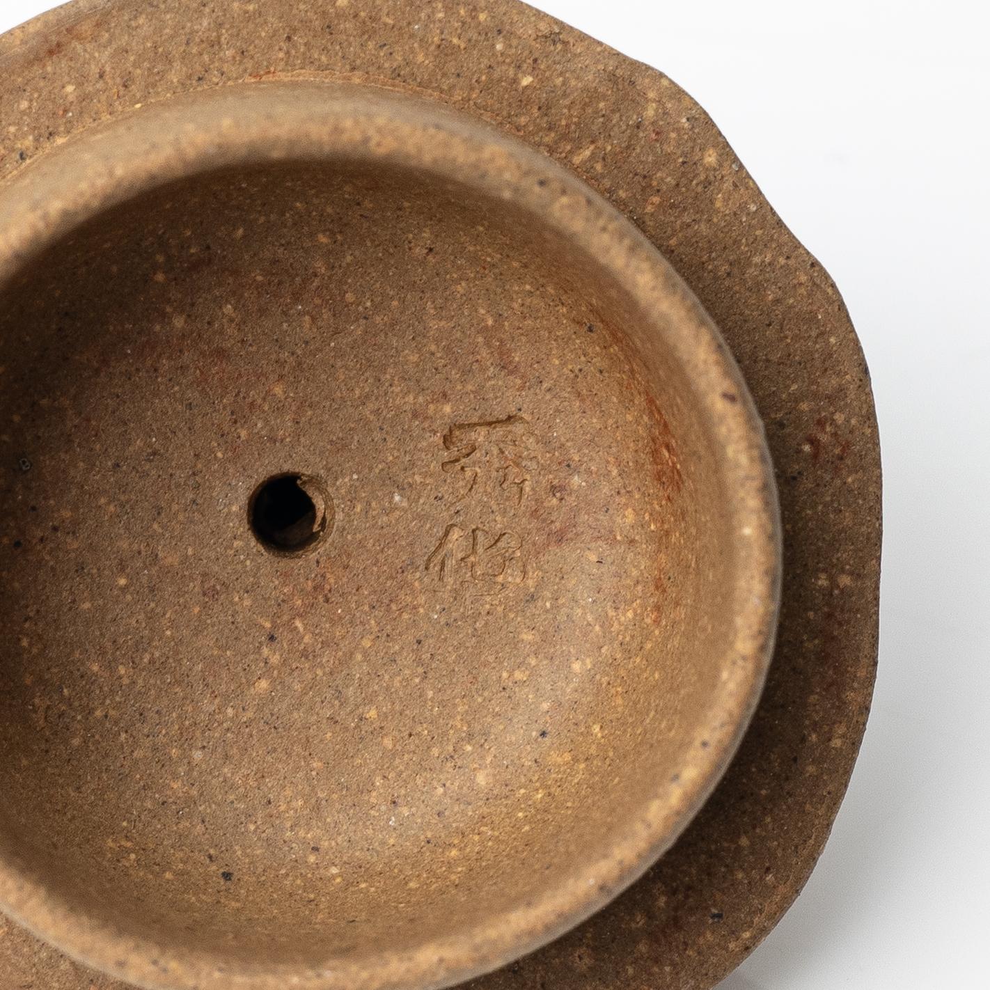 Two yellow yixing teapots, China, 1980/90s.