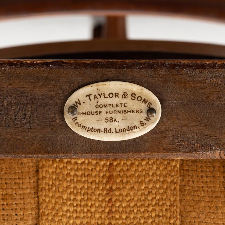 A set of 7 chairs, Empire style, W. Taylor & Sons, circa 1900.