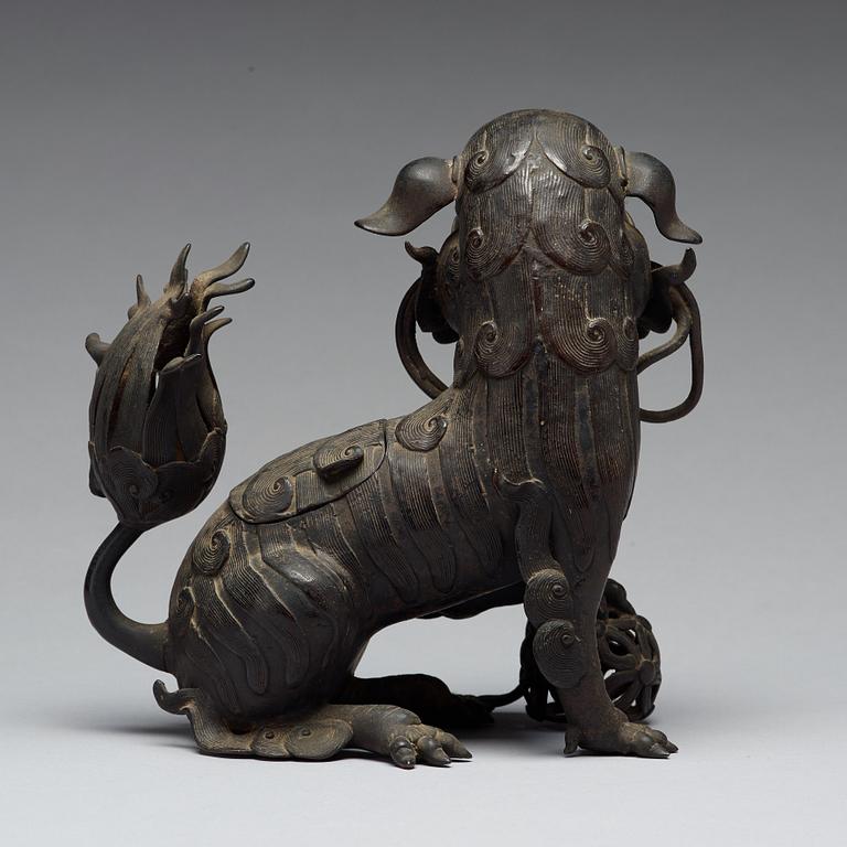 A bronze censer with cover in the shape of a Buddhist lion, Qing dynasty, 19th Century.