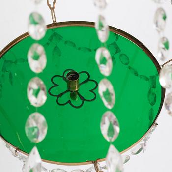 A German Louis XVI ormolu and cut-glass nine-light chandelier attributed to Johann Christoph Ermisch, late 18th century.