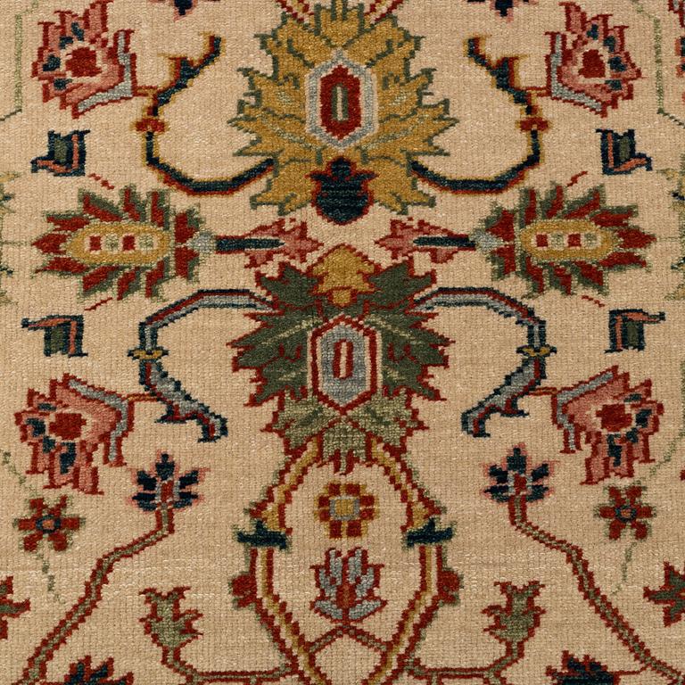 A RUG, Ushak design, ca 184 x 123 cm.