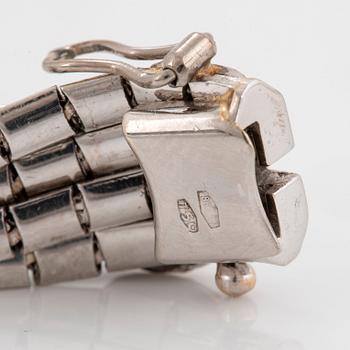 Armband 18K vitguld med fasettslipade smaragder.