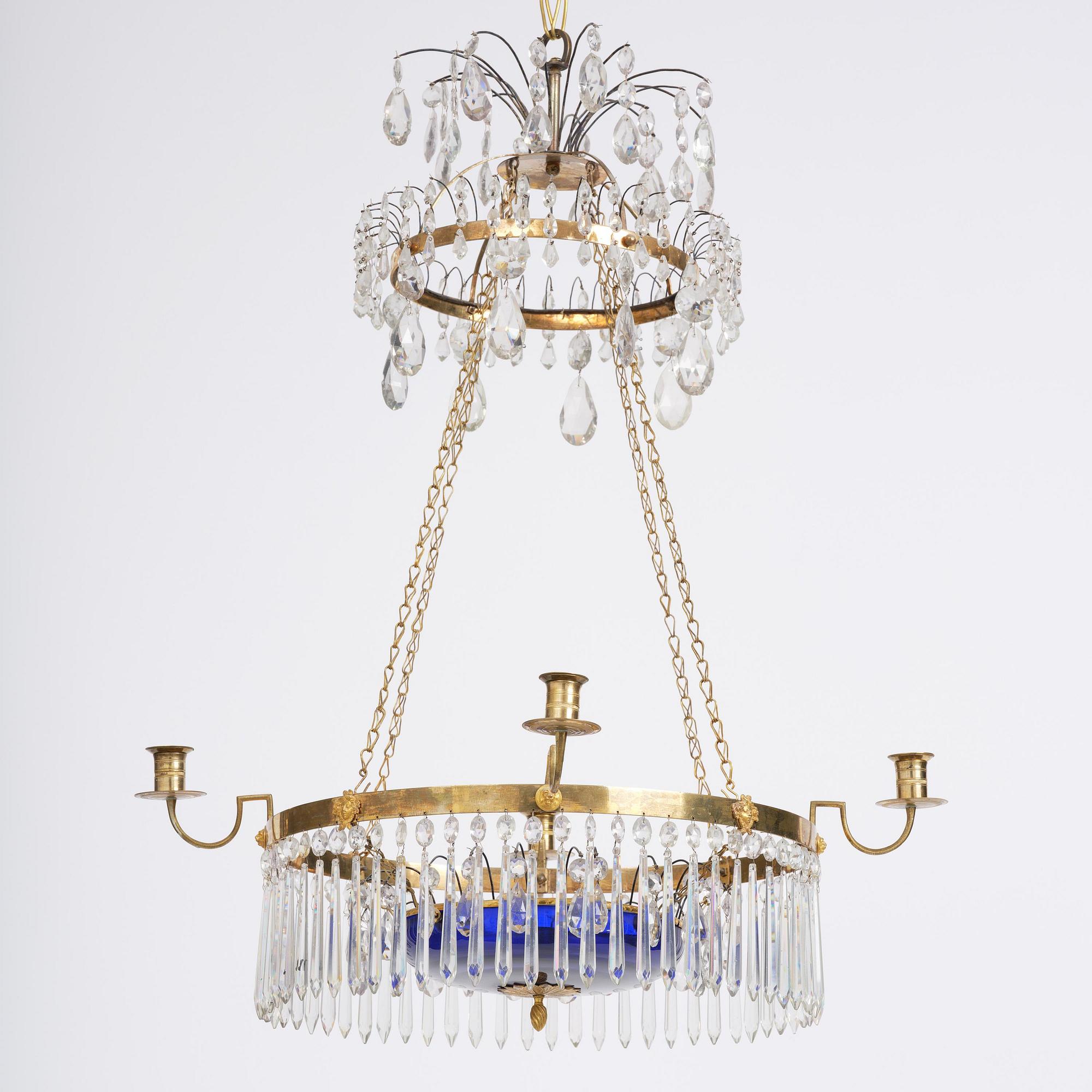 A late Gustavian five-light gilt brass and cut glass chandelier, Stockholm, late 18th century.