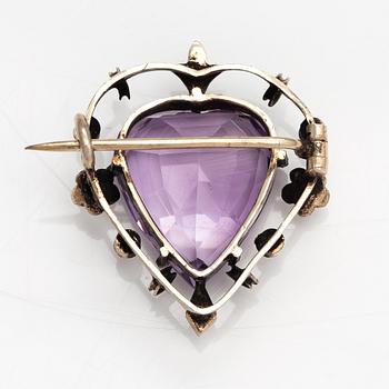 A necklace, bracelet and two brooches in gilded silver and with amethysts and pearls.