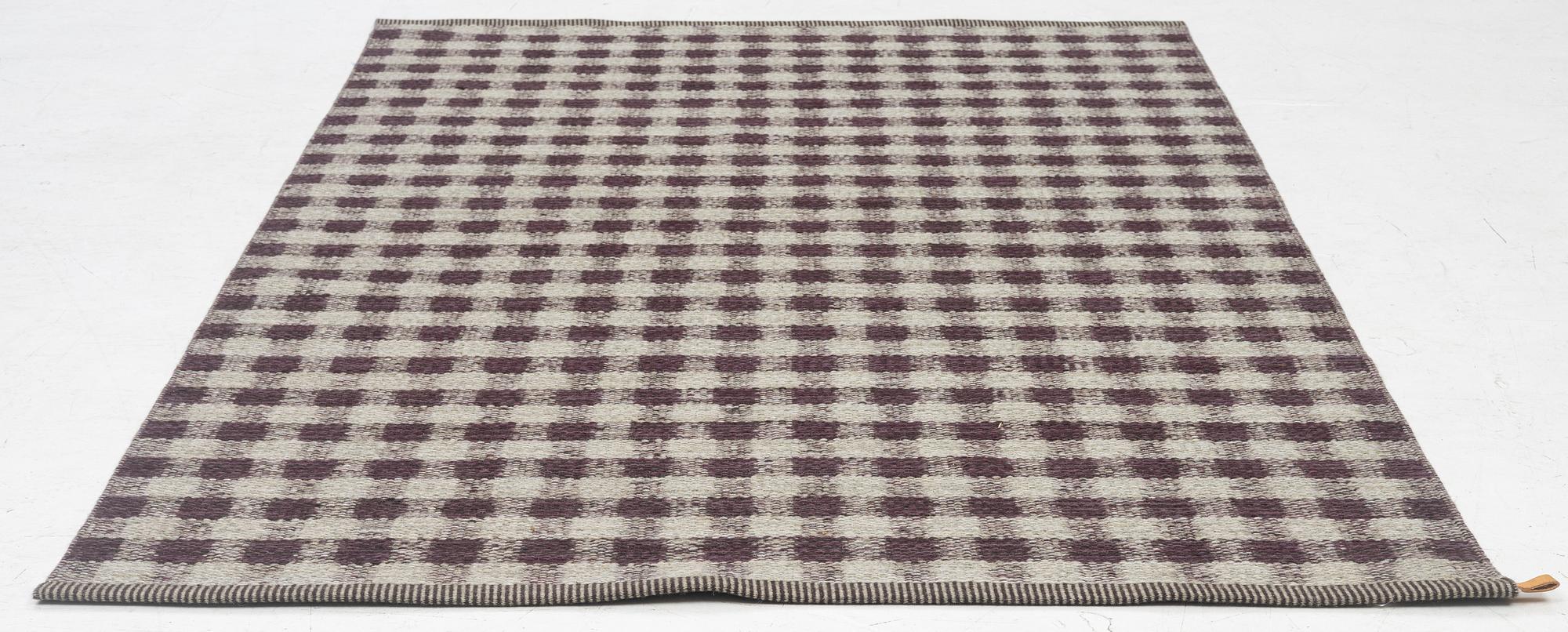 A flat weave "Vichy" carpet from Kasthall, c. 198 x 136 cm.