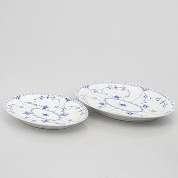 An 84-piece porcelain "blue fluted" dinner and coffee service, full and half lace, Royal Copenhagen, Denmark.