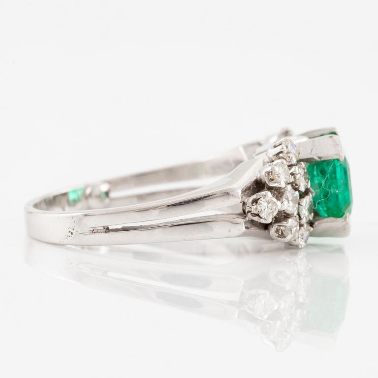 A W.A. Bolin ring 18K white gold with an emerald-cut emerald and brilliant-cut diamonds.
