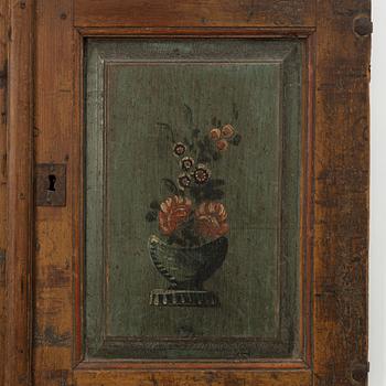 A pair of folk-art cabinet doors mounted as a painting, first part 19th century.
