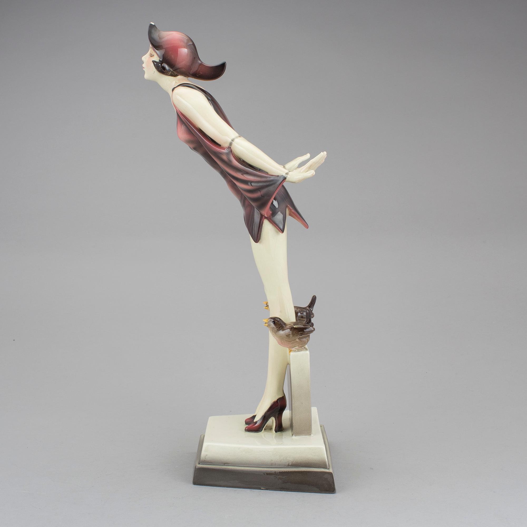 STEFAN DAKON, figurin, flintgods, Goldscheider, 1900-talets första hälft.