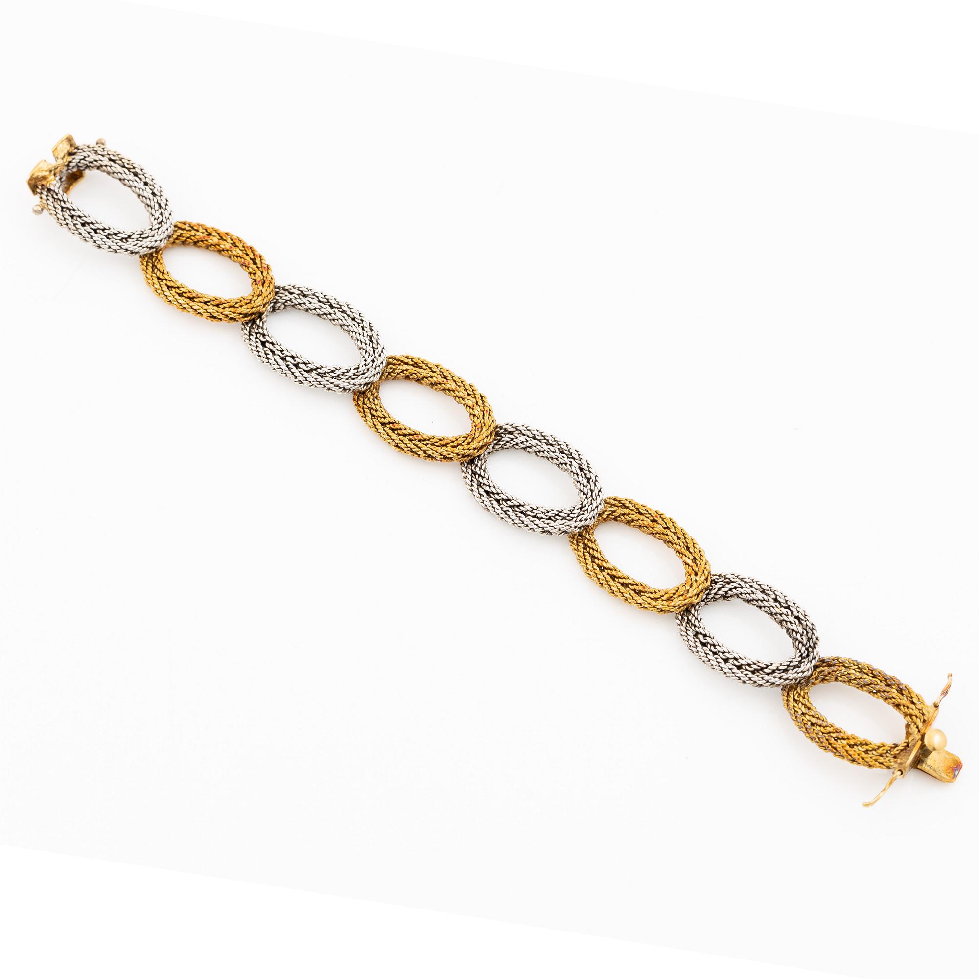 Armband 14K tvåfärgat guld i form av flätade ovala länkar, omkring ca 1950-70-tal.