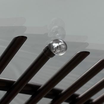 WARREN PLATNER, a glass top dining table.