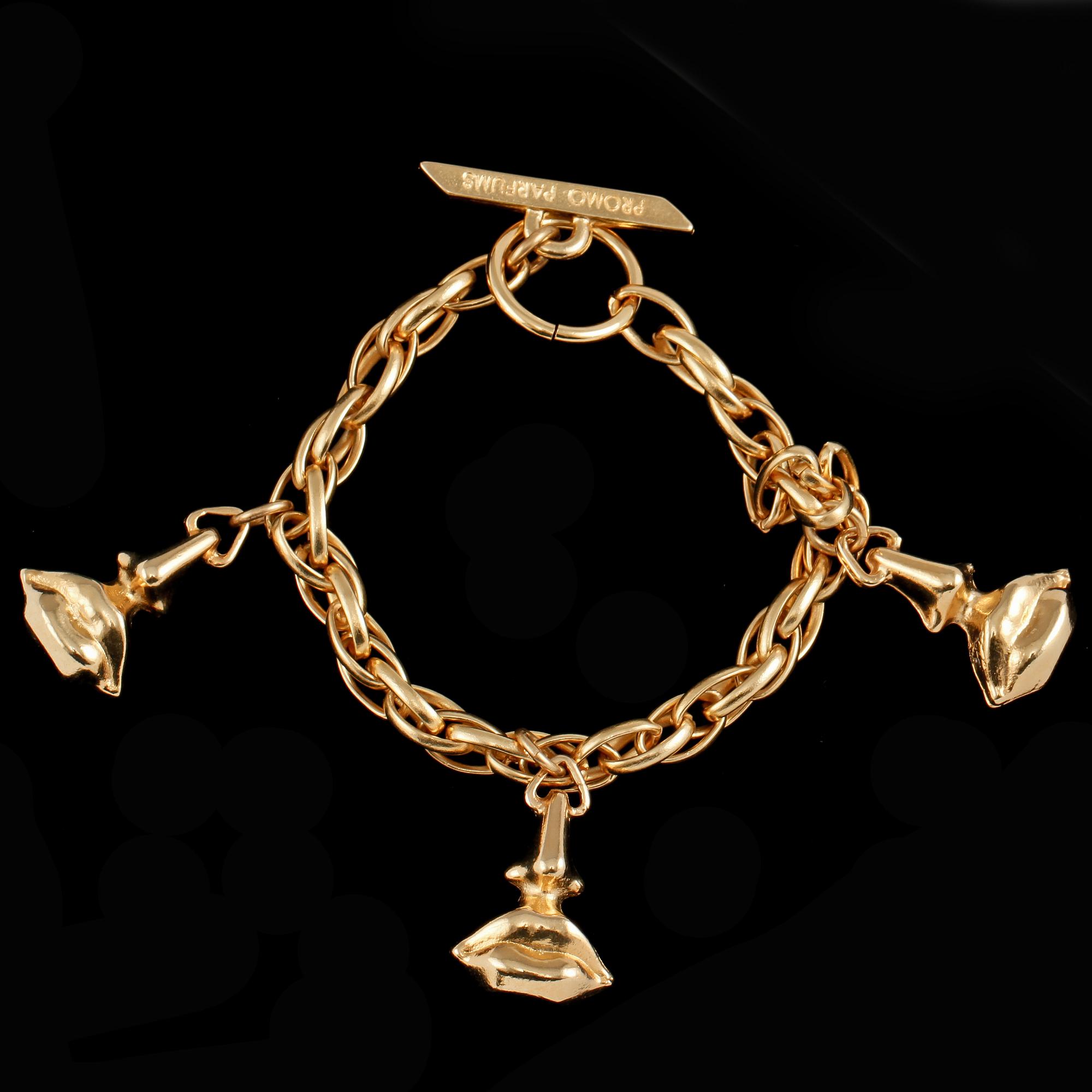 BERLOCKARMBAND, BROSCH SAMT HÄNGE, gulmetall, Salvador Dali, 1900-talets sista kvartal.