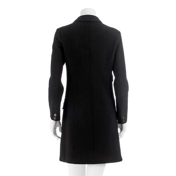 MOSCHINO, a black blendmaterial coat from the 1990s. Italian size 42.