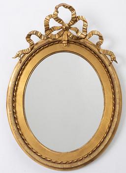 A Gustavian style mirror, early 20th Century.