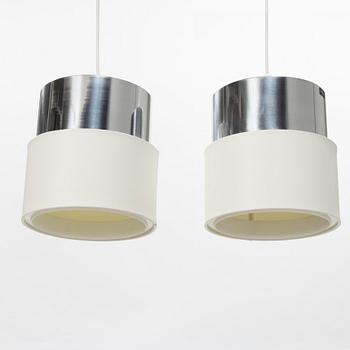 Uno & Östen Kristiansson, a pair of ceiling lights from the 'Cylindus' series, Luxus, Vittsjö, 1970's.