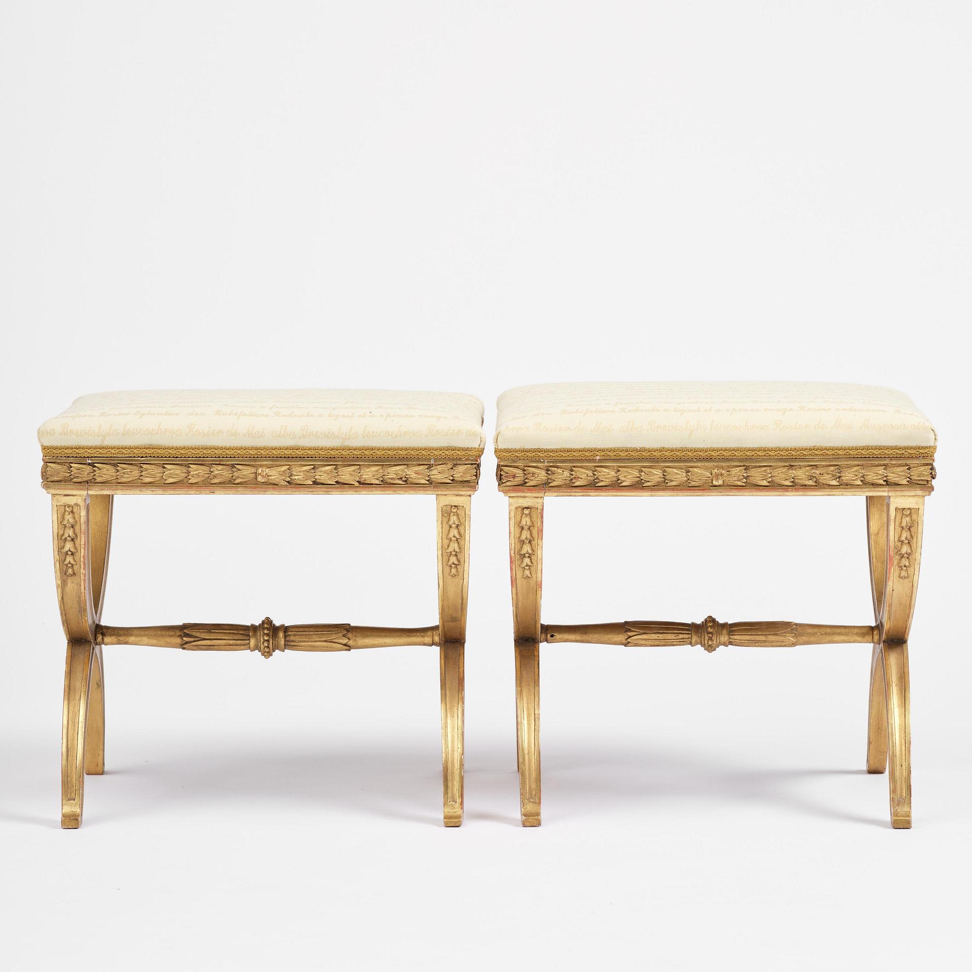 A pair of late Gustavian giltwood stools, Stockholm, late 18th century.