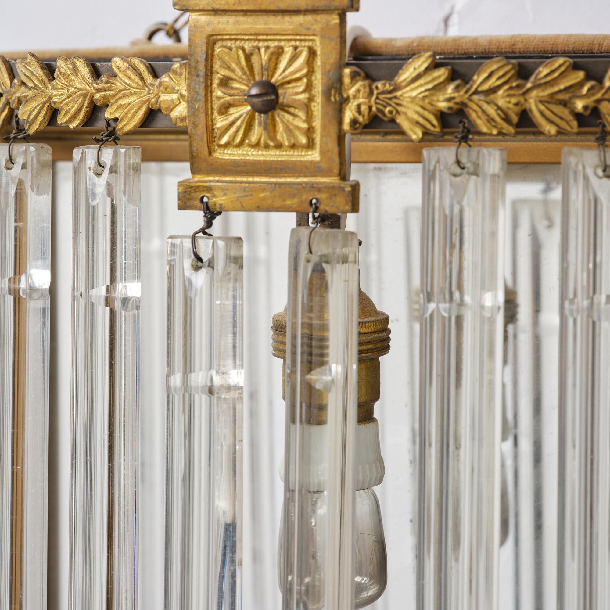 A pair of mirror sconces, 1910's/20's.