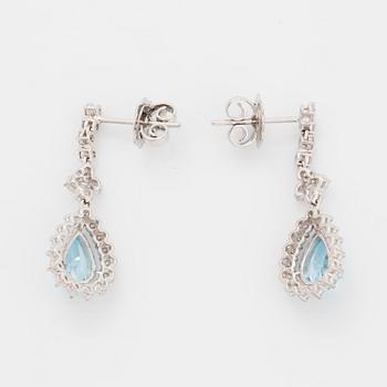 Topaz and brilliant-cut diamond earrings.