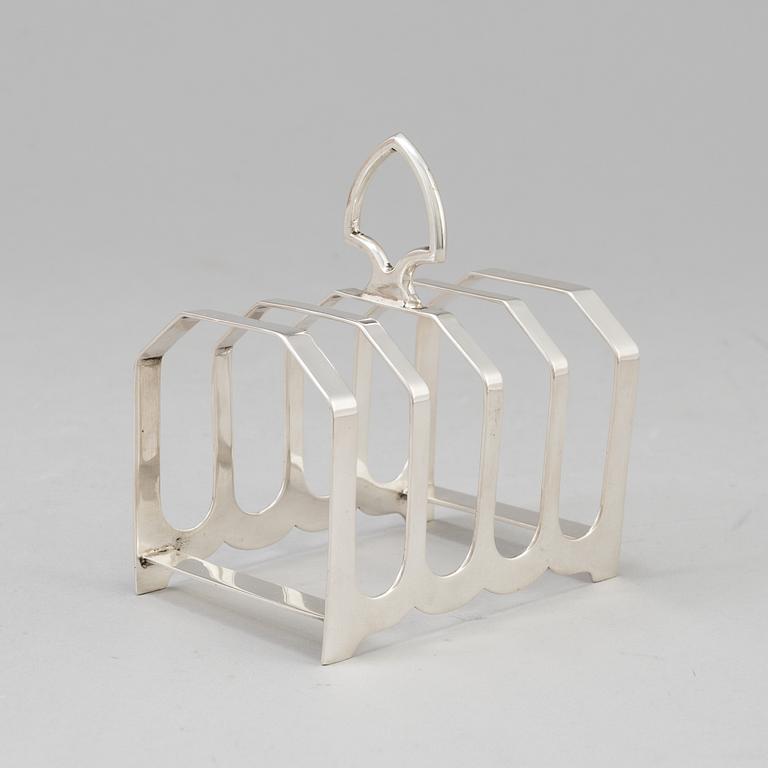 A Four silver toast racks by  silver, Turner & Simpson, Sheffield, 1935.