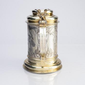 A German parcel-gilt silver tankard, mark of Walter Kopman, Hamburg (1649-1688).