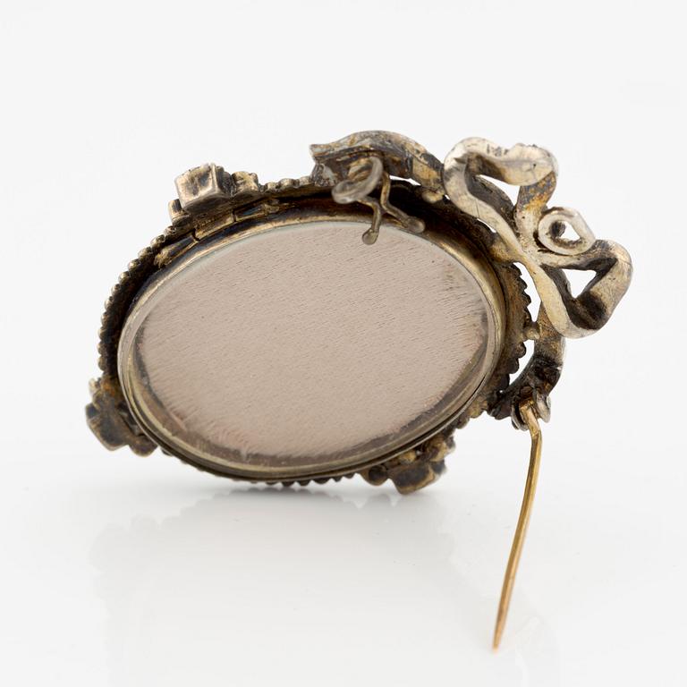 Brooch/pendant, silver, with portrait, after Jean-Baptiste Greuze, with seed pearls and small rubies.