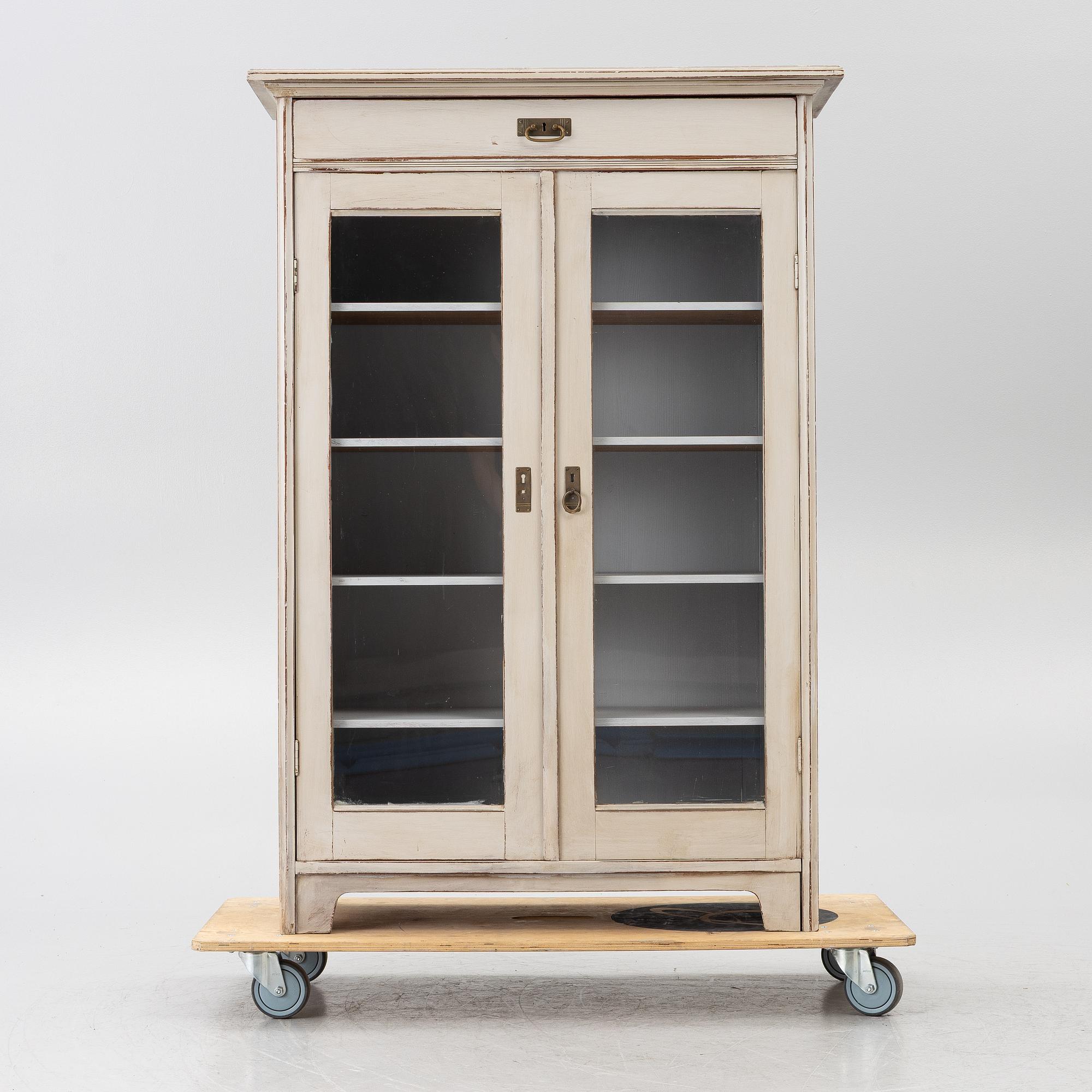 Display cabinet, early 20th century.