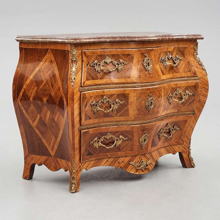 A rosewood-veneered and ormolu-mounted Rococo chest of drawers by J. Wahlbeck (master 1760-1782).