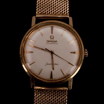 ARMBANDSUR, herr. Omega seamaster automatic, 1950-tal. 14K guld med guldrem. Totalvikt 78 g.
