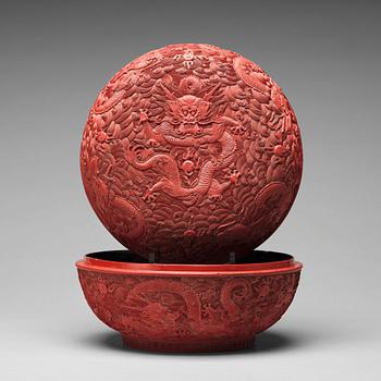 734. A carved red dragon box with cover, Qing dynasty (1662-1912).