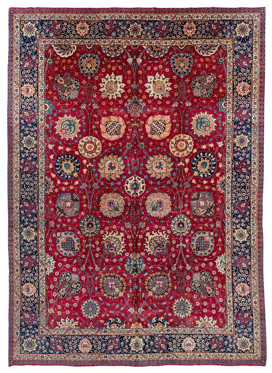 A fine Meshed carpet of 'Vase' design, North-East Persia, c. 480 x 345 cm.