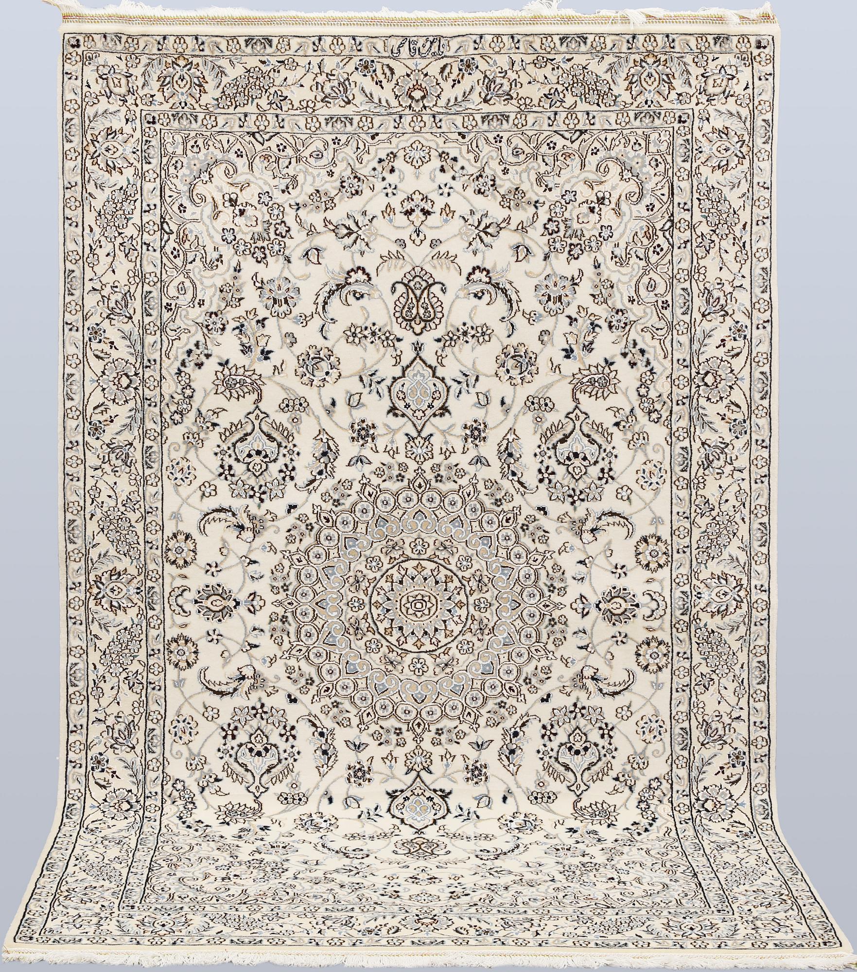 A Nain rug, part silk, so-called 9LAA, c. 210 x 130 cm.