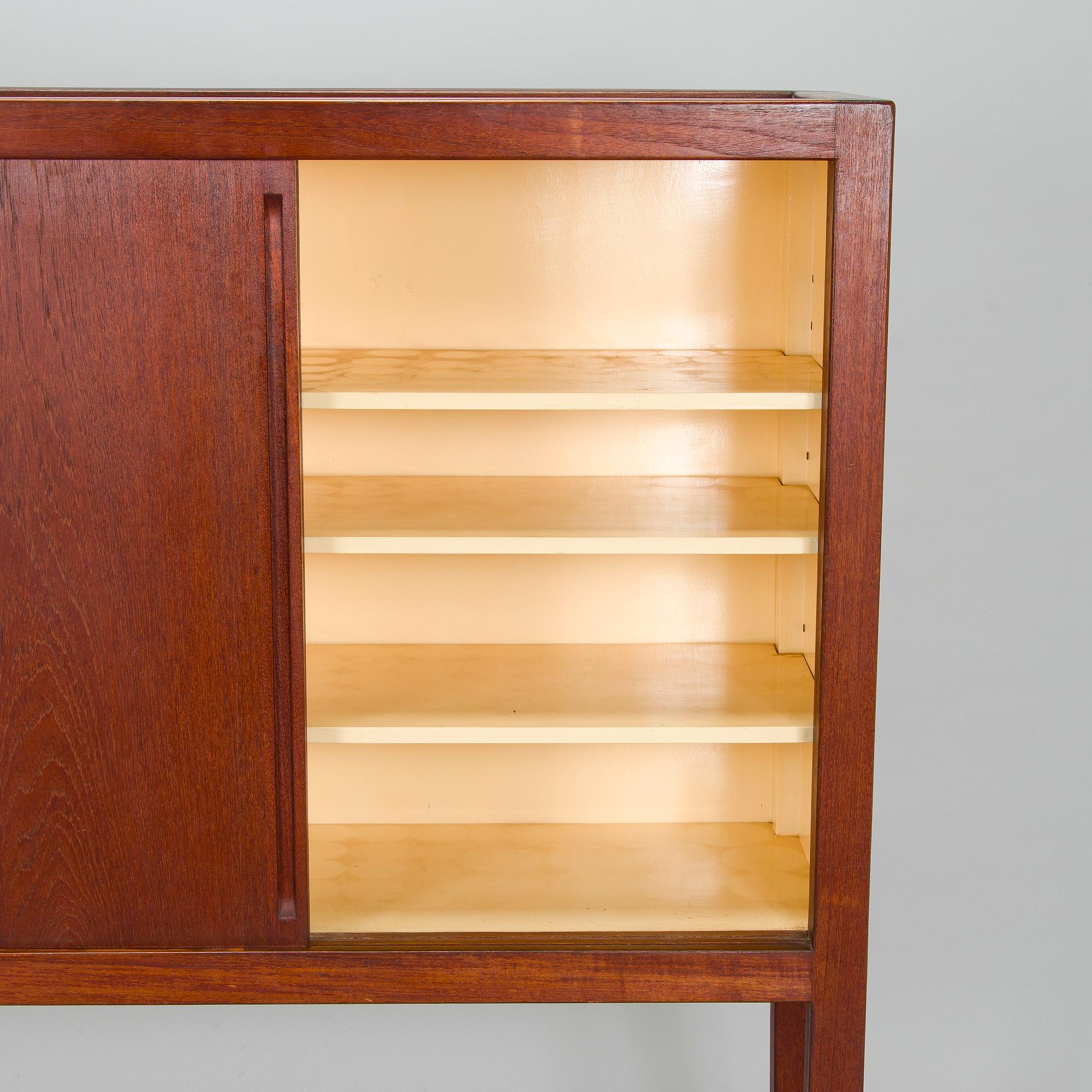 Carl Gustaf Hiort af Ornäs, a mid-20th-century cupboard 'Näyttely- astiakaappi' for HMN Huonekalu Mikko Nupponen, Lahti,.