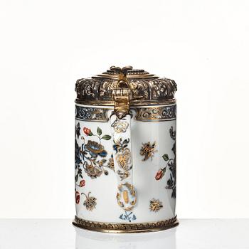 A Silvermounted Meissen tankard, 1740's. Silver makers mark, Nürnberg, Joh. Nic. Wollenberg (1759-1789).