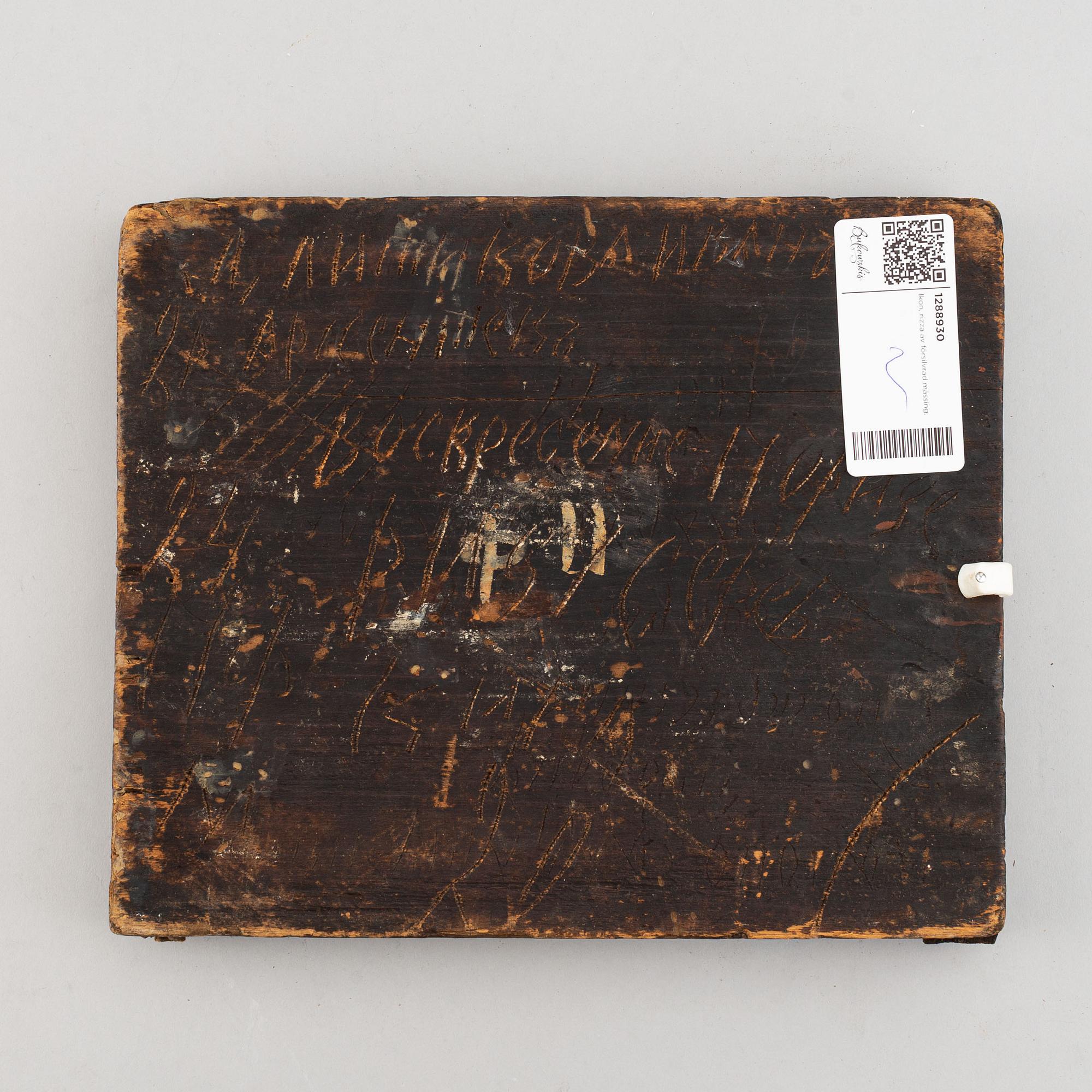 A russian icon with ochlad, rempera on panel, 19th Century.