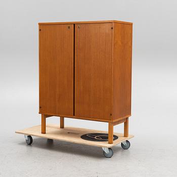 A teak cabinet from Asko, 1950's/60's.