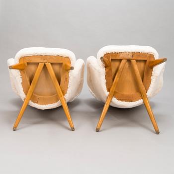 CARL GUSTAF HIORT AF ORNÄS, Two mid-20th century 'Siesta' armchairs for för Puunveisto Oy - Träsnideri Ab.