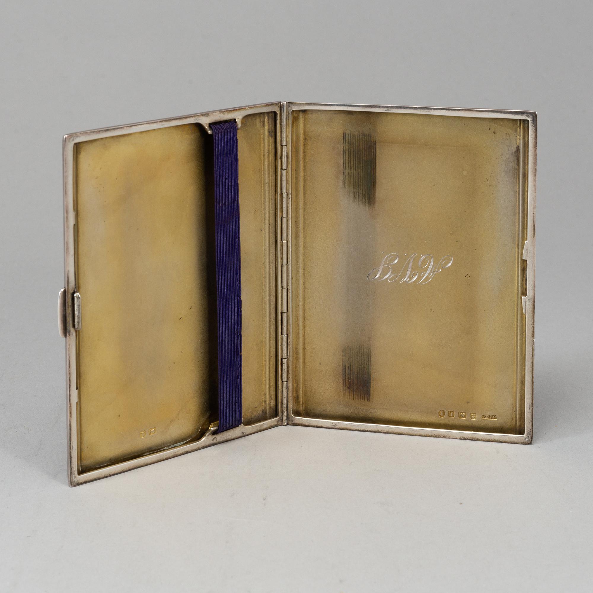 A sterling silver cigarette-case, made in 1935 by Dingley (or Davies) Brothers, Birmingham, England.
