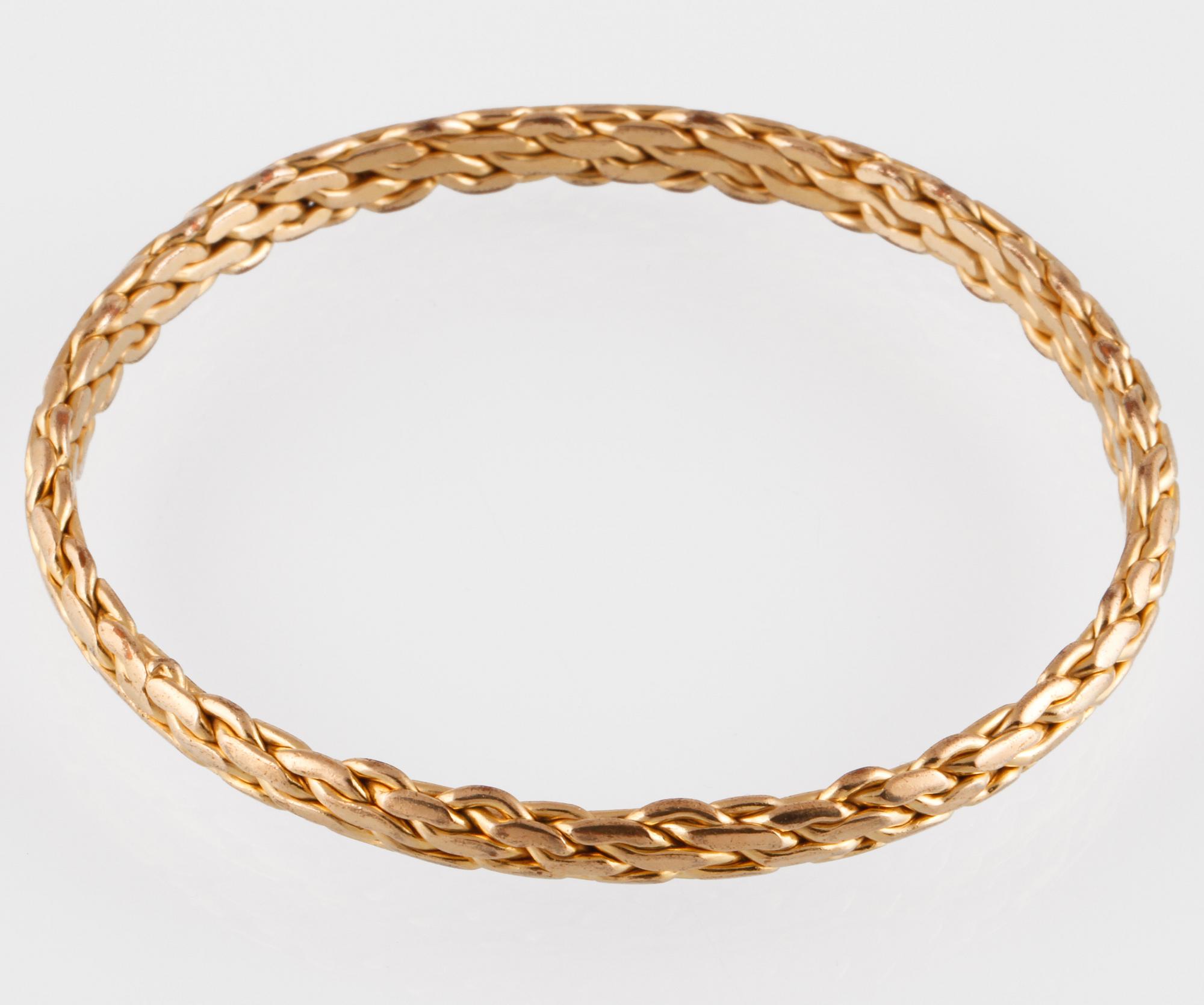 ARMRING, 10K guld, utländsk stämpel. Vikt 24,8 gram.