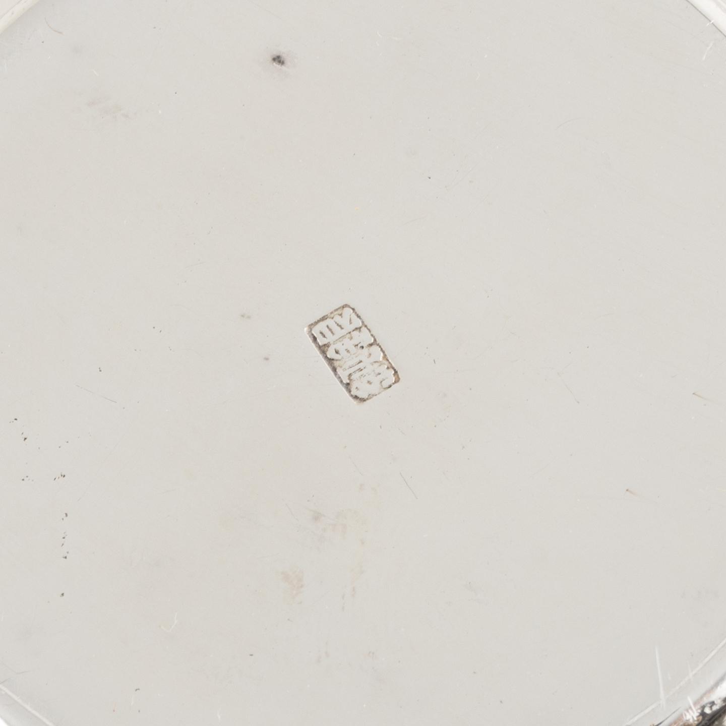 Two Japanese silver dishes, two small ewers and a box with cover, 20th Century.
