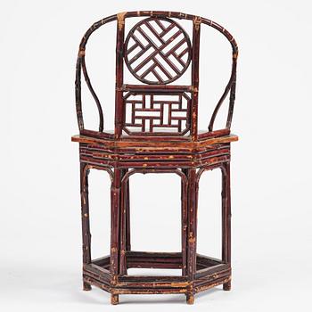 A Chinese bamboo horseshoeback armchair, late Qing dynasty.
