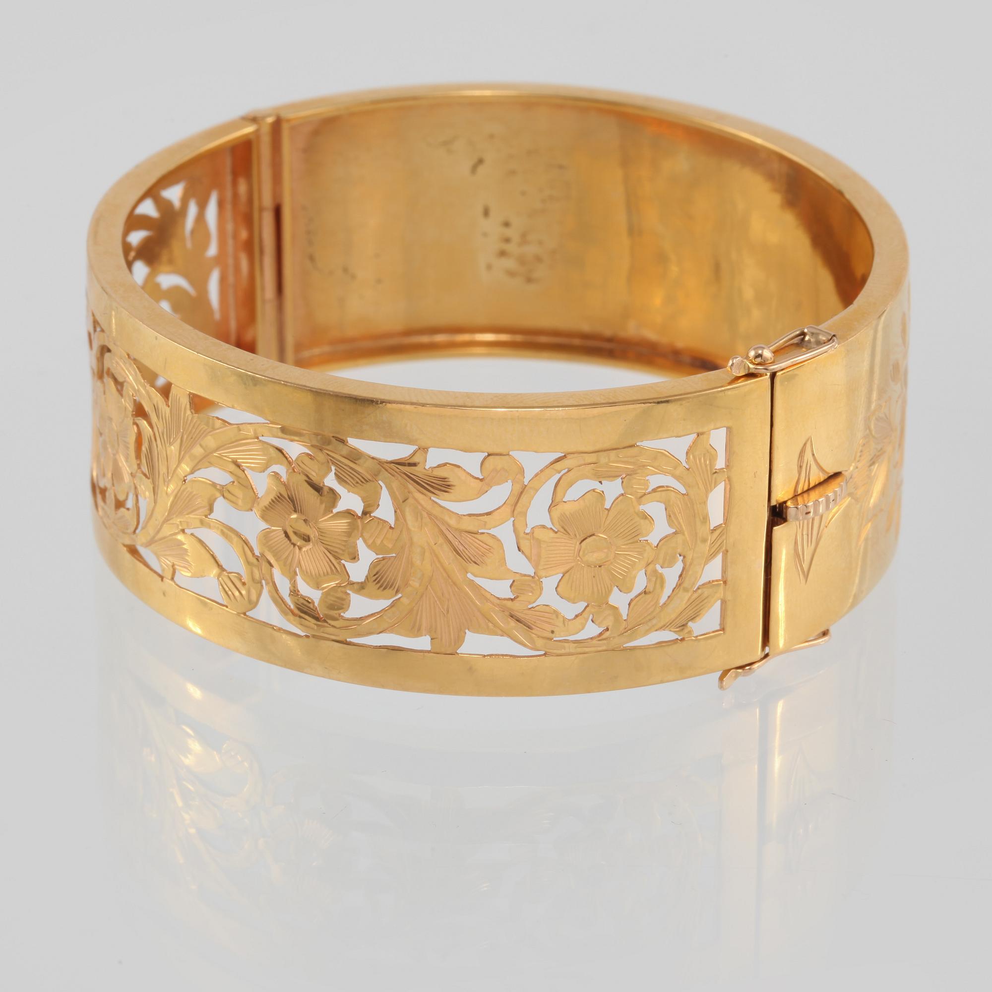 ARMRING, 18K guld. Vikt 45,1 gram.