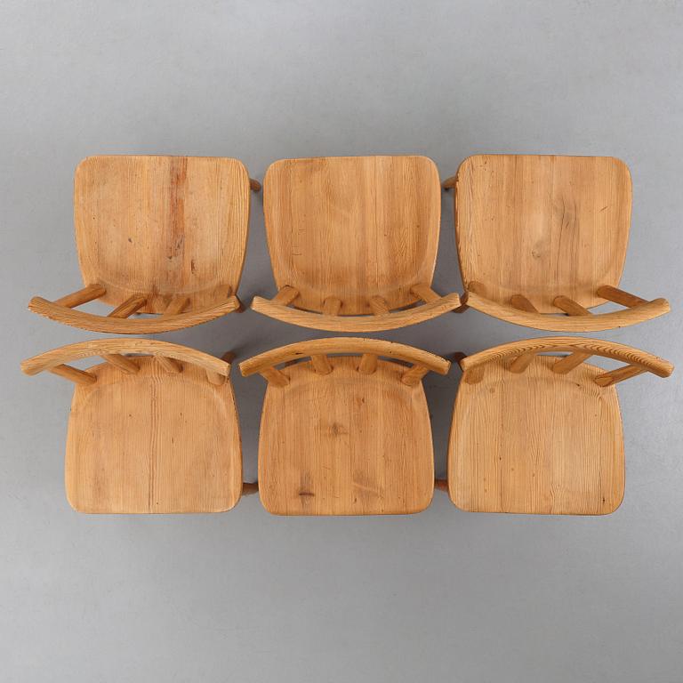 Axel Einar Hjorth, a set of six "Utö" stained pine chairs, Nordiska Kompaniet, Sweden 1930's.