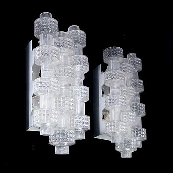 A pair of wall lamps by Gert Nyström for Fagerhult, second half of the 20th century.