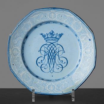 21. A Rörstrand faience dinner plate, dated Stockholm 15/3 1745.